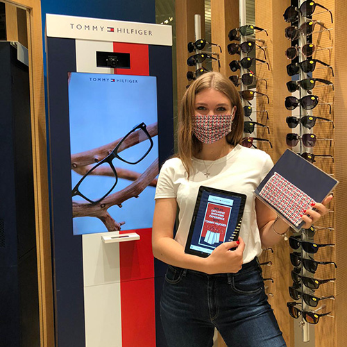Event staff in Hyundai uniforms managing documentation at a motor show &mdash; automotive event hostesses in New York